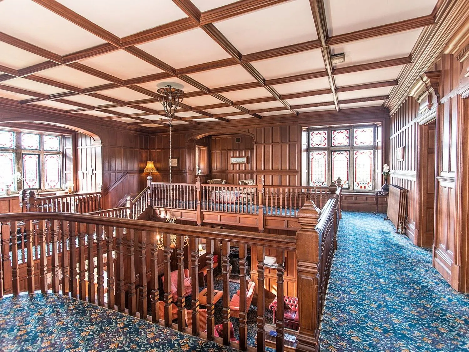 View across the first floor of the entrance hall at Alston Hall.