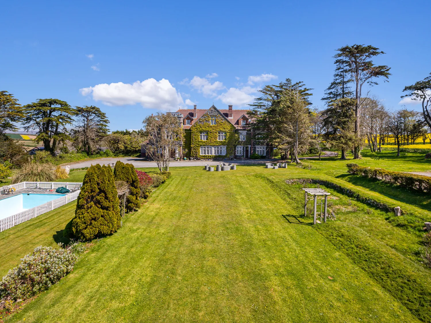 Front lawn of Alston Hall including outdoor swimming pool.