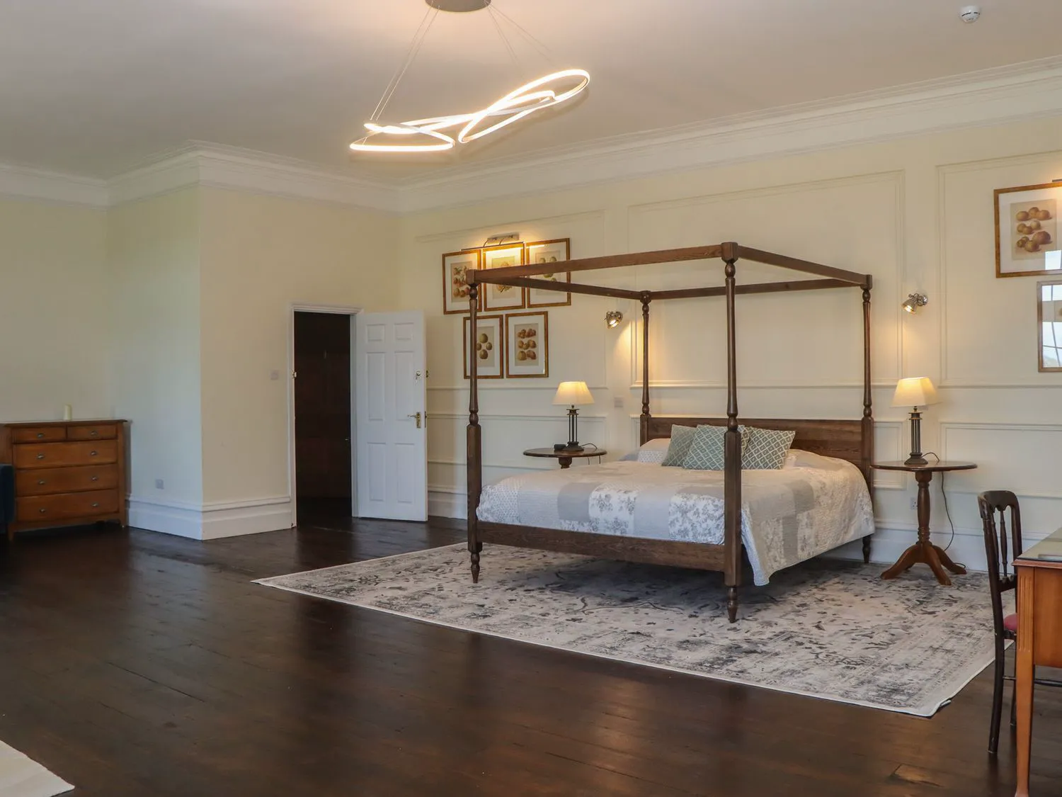 Master bedroom with four-poster bed.