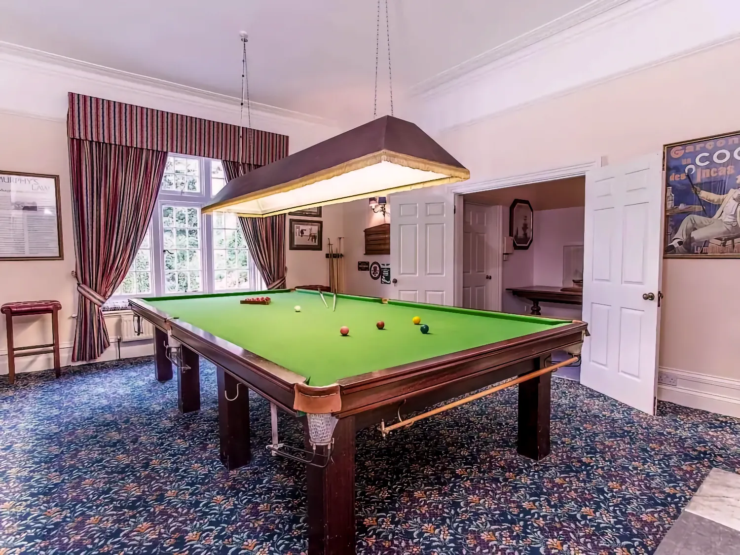 Games room with full size Snooker table.