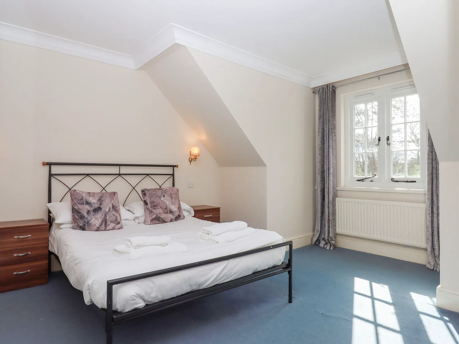 Spacious third floor double bedroom.