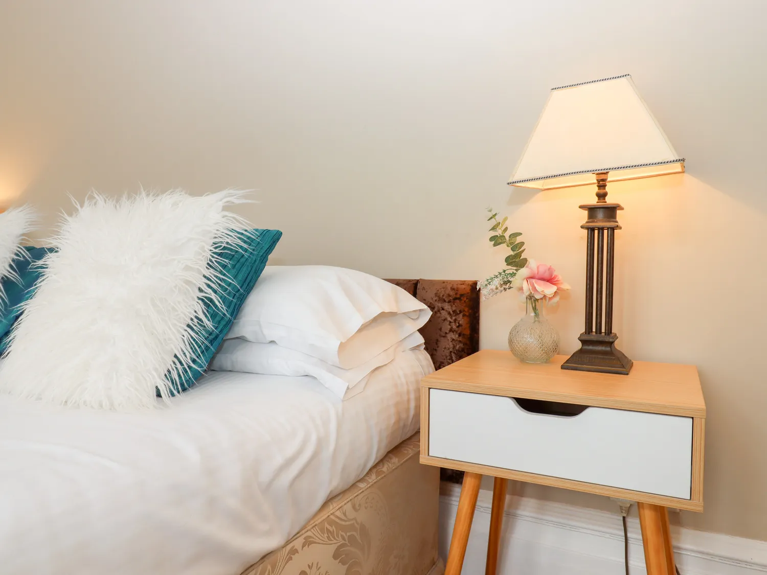 Comfortably furnished bedroom at Alston Hall.