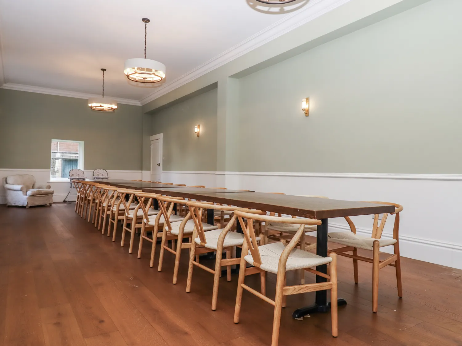 Dining room table comfortably seats 22 people.
