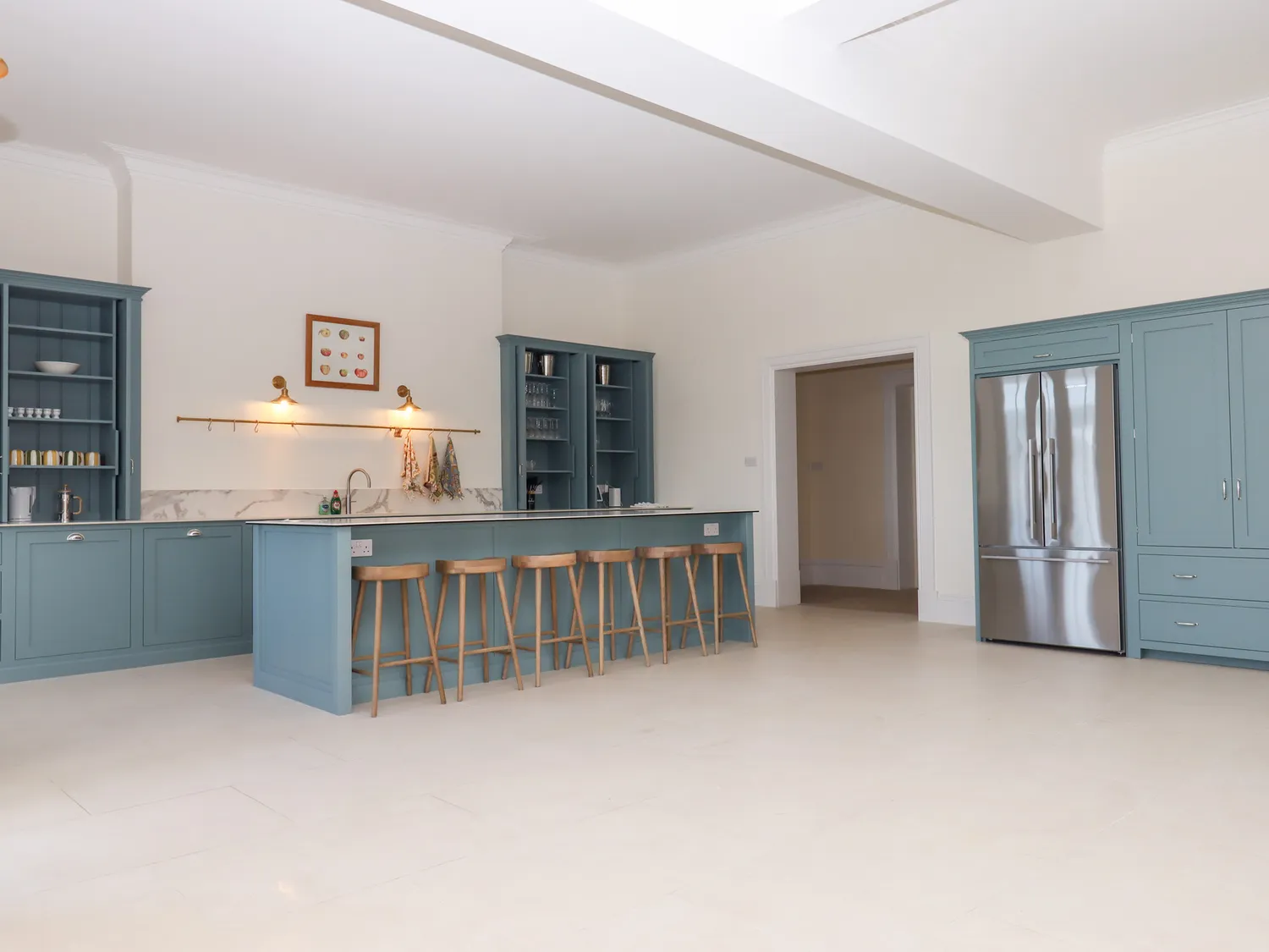 Modern high end appliances including double door fridge freezer.
